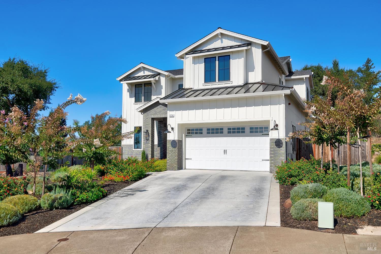 3724 Stanhope Court Santa Rosa, CA 95404 - Photo 5 of 78 a front view of a house with a yard and garage