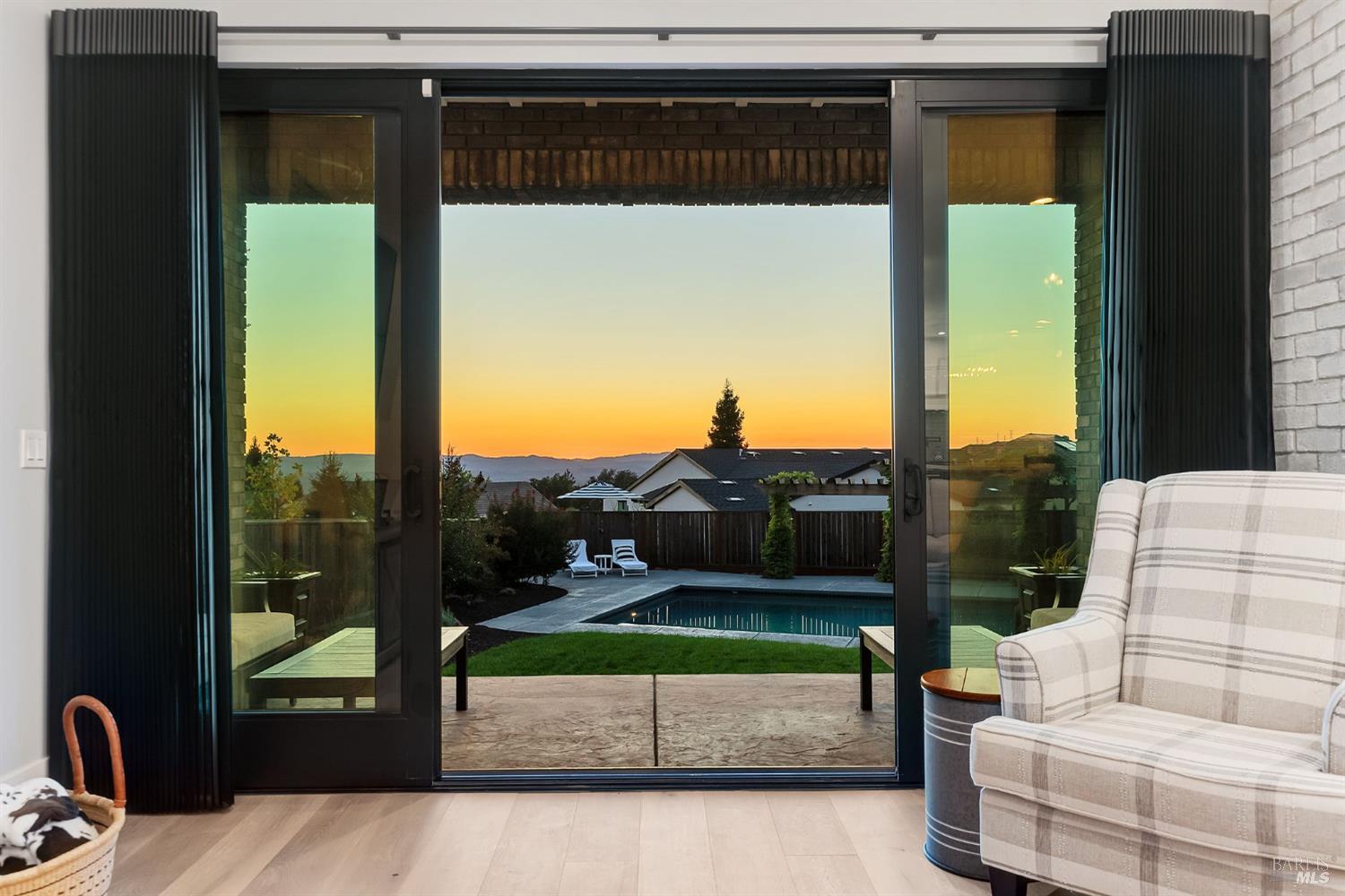 3724 Stanhope Court Santa Rosa, CA 95404 - Photo 61 of 78 a view of a porch with a couch and a floor to ceiling window