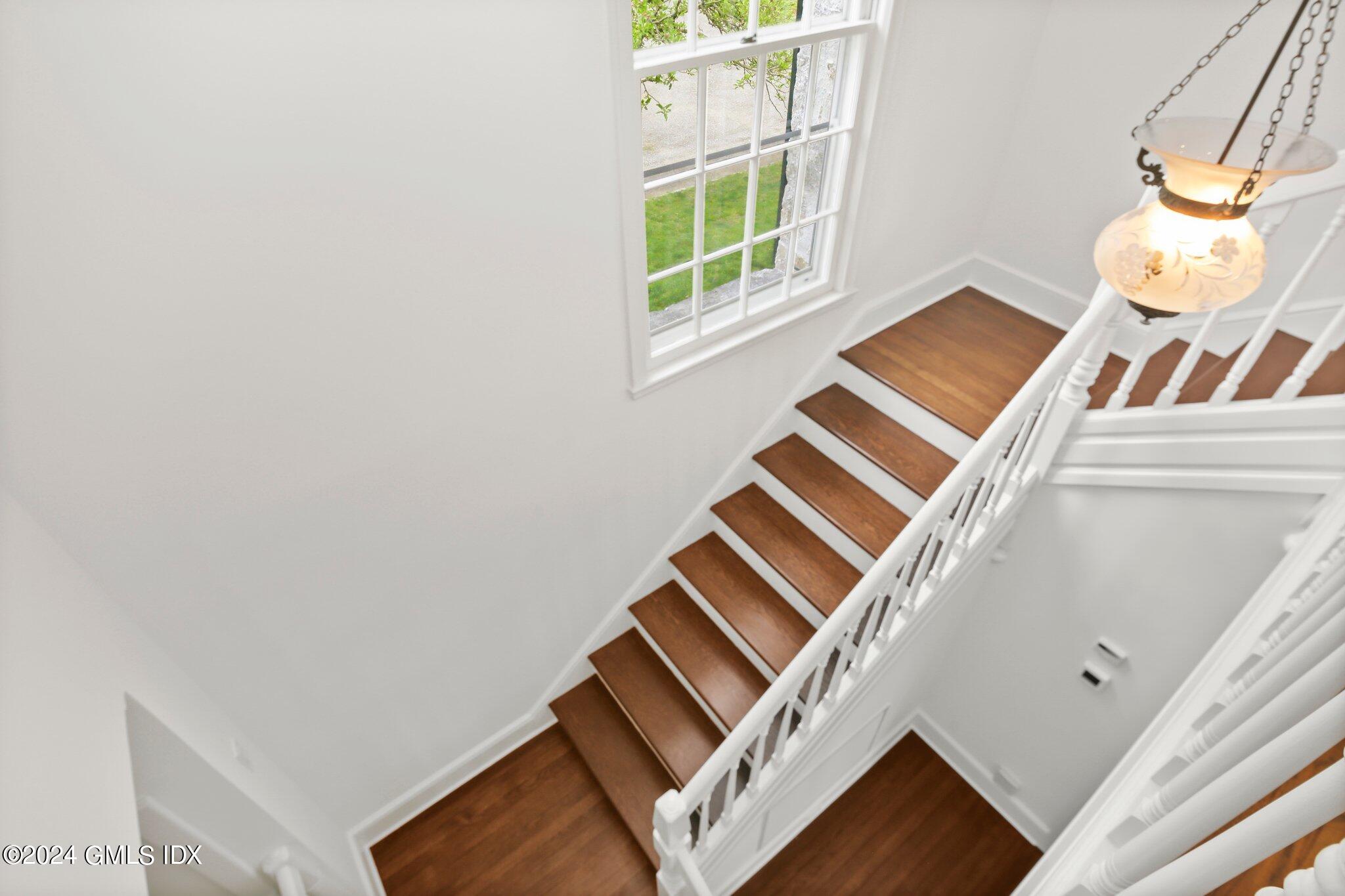 69 Clapboard Ridge Road Greenwich, CT 06830 - Photo 17 of 40 a view of an empty room and window
