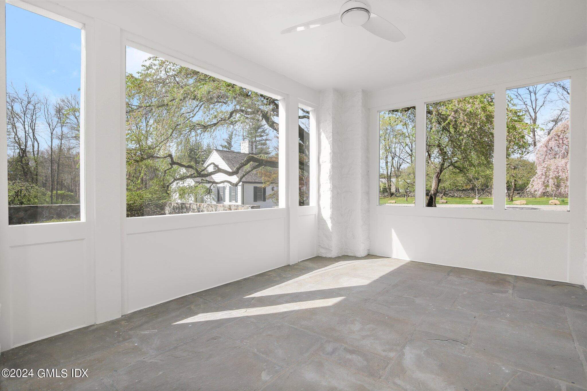 69 Clapboard Ridge Road Greenwich, CT 06830 - Photo 28 of 40 a view of an empty room with a window