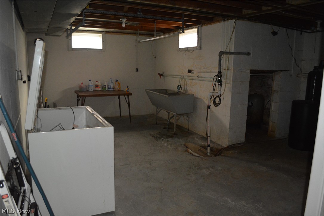 5674 Myers Road New Franklin, OH 44319 - Photo 26 of 26 Laundry area, sump pump and well room.