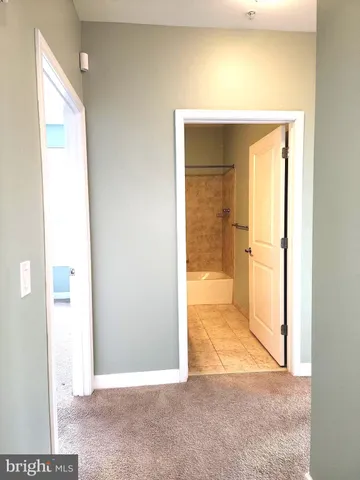 a view of a bathroom with a glass door