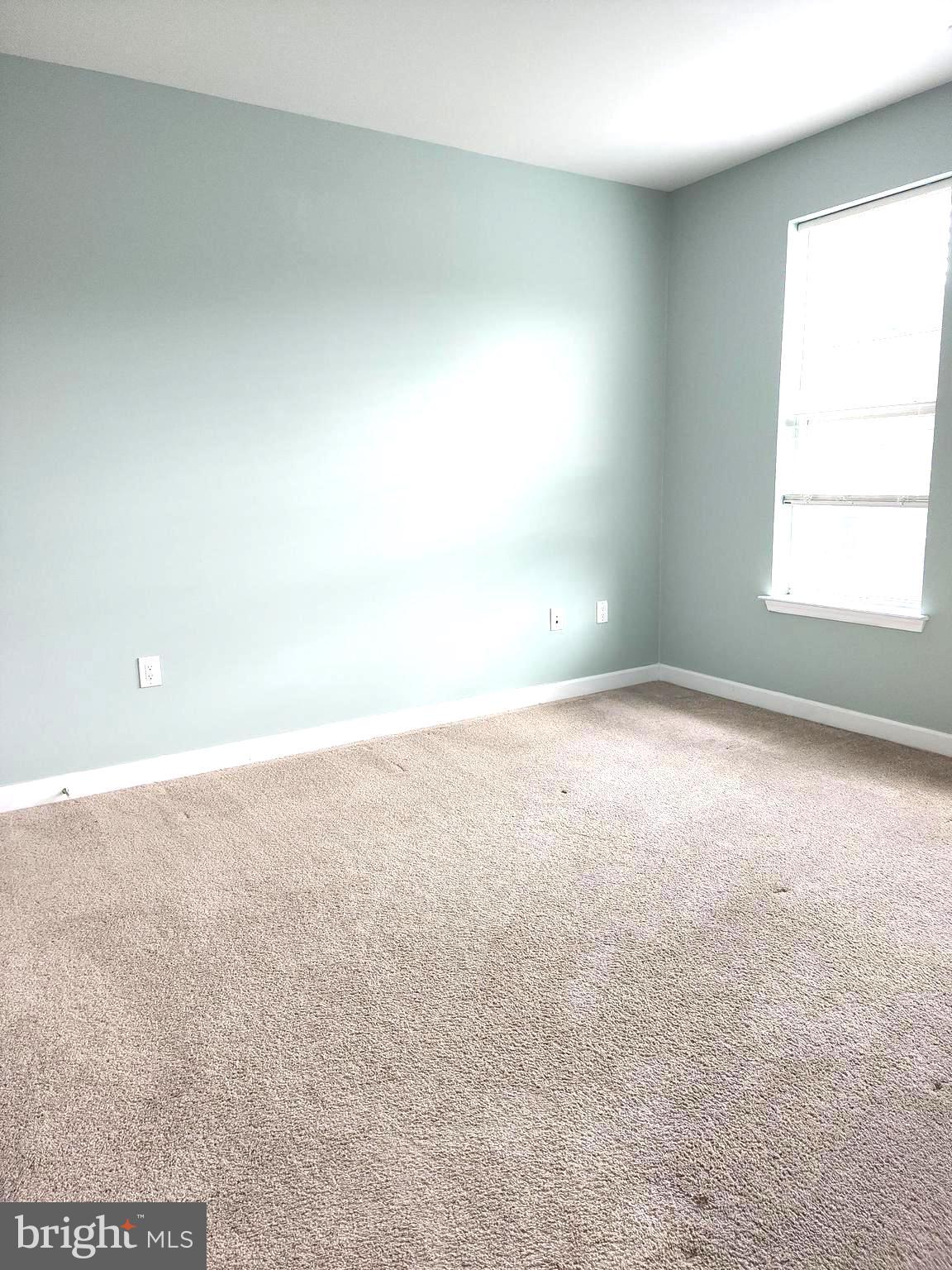 2610 Sheridan Road Southeast, Unit 3 Washington, DC 20020 - Photo 15 of 30 an empty room with a windows and closet