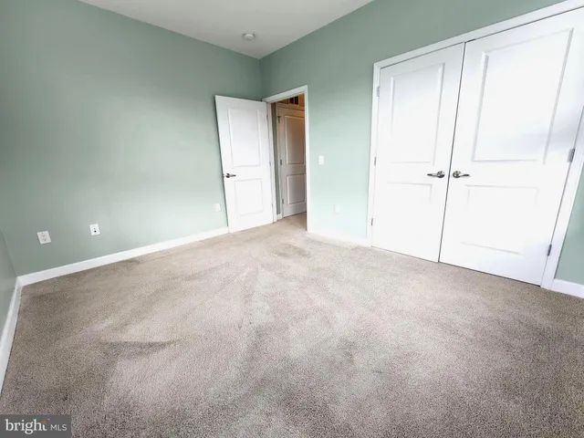 an empty room with an entryway