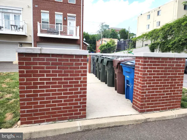 a view of a car parked in front of a building