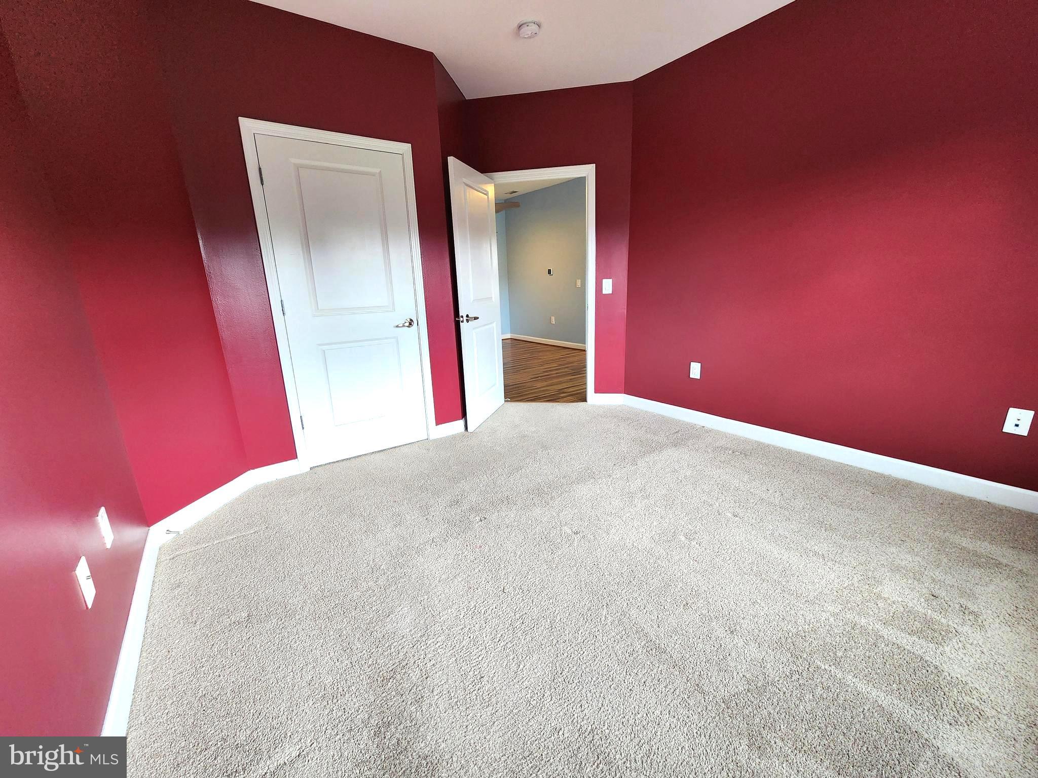 2610 Sheridan Road Southeast, Unit 3 Washington, DC 20020 - Photo 10 of 30 a view of a big room with closet and mirror