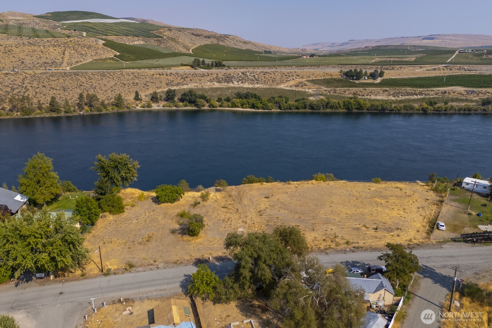 1751 Fairview Avenue Bridgeport, WA 98813 - Photo 11 of 13 a view of a lake with a mountain