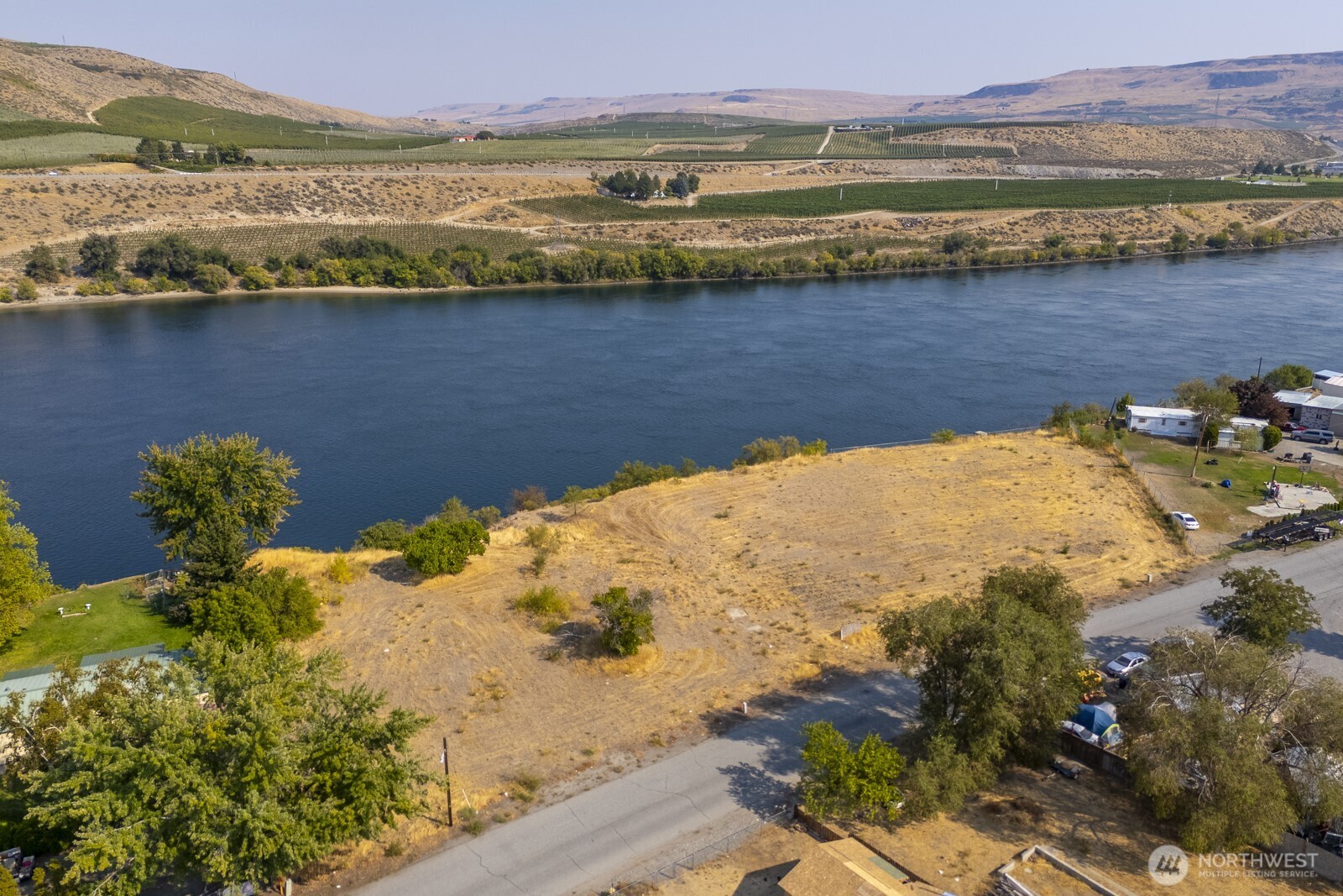 1751 Fairview Avenue Bridgeport, WA 98813 - Photo 6 of 13 a view of a lake with a mountain