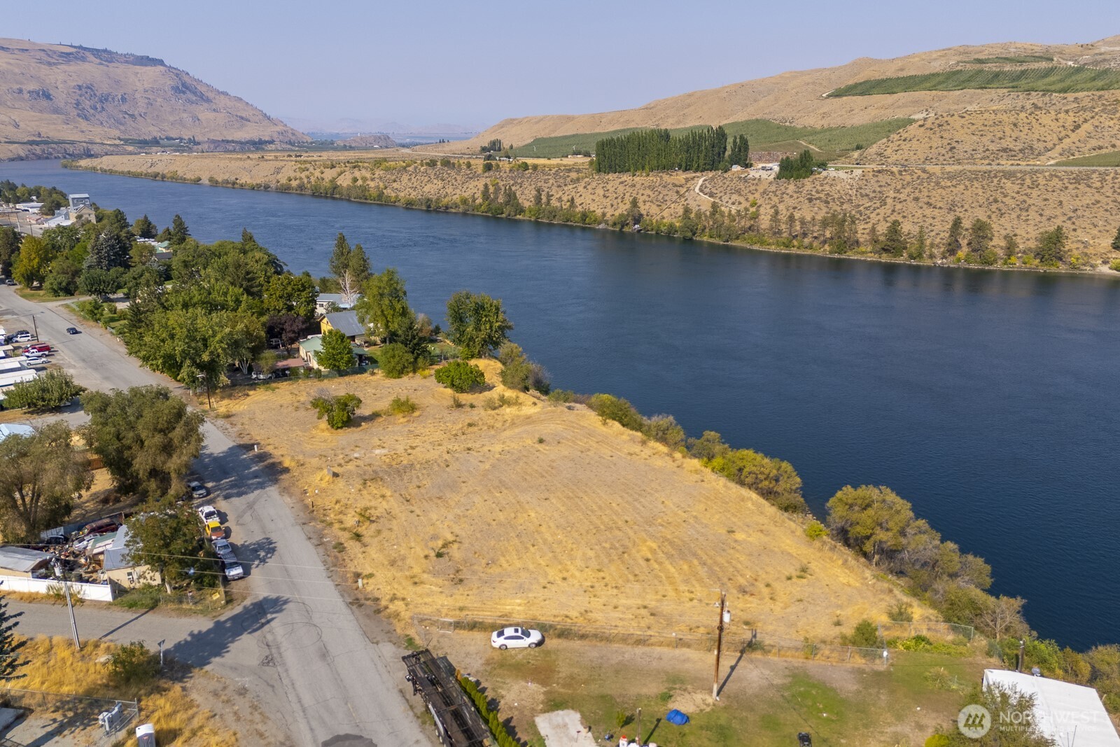 1751 Fairview Avenue Bridgeport, WA 98813 - Photo 7 of 13 a view of a lake with a mountain