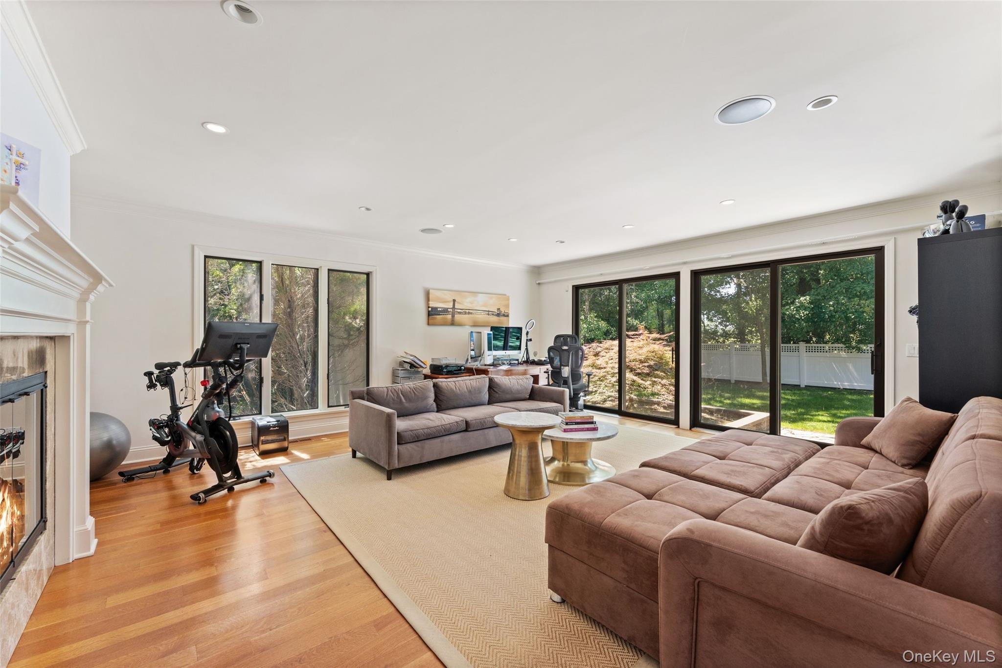 6 Magnetti Circle Mamaroneck, NY 10543 - Photo 9 of 24 a living room with furniture and a large window