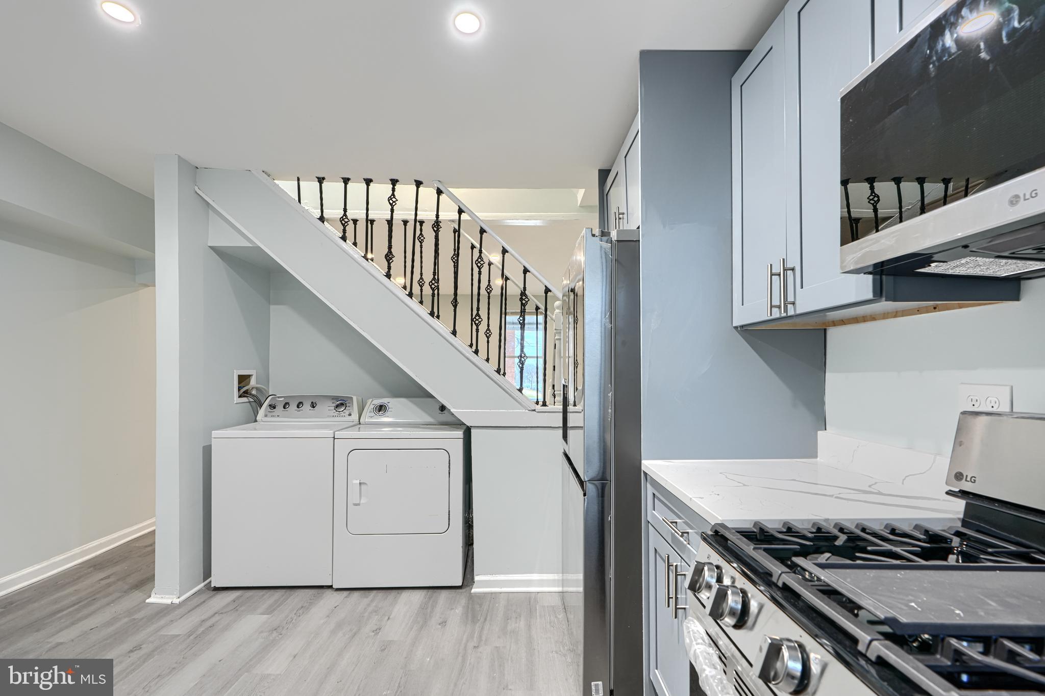 3606 Old York Road Baltimore, MD 21218 - Photo 16 of 35 a kitchen with a stove and a wooden floors