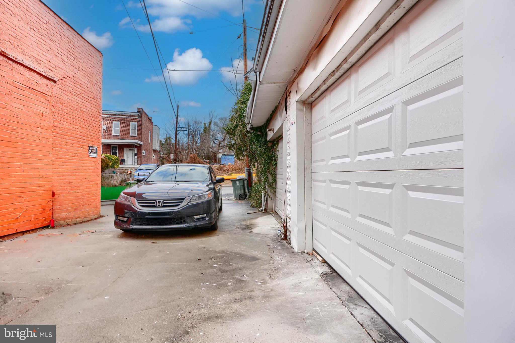 3606 Old York Road Baltimore, MD 21218 - Photo 35 of 35 a car parked in front of a building