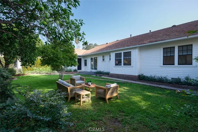 a white toilet sitting next to a window