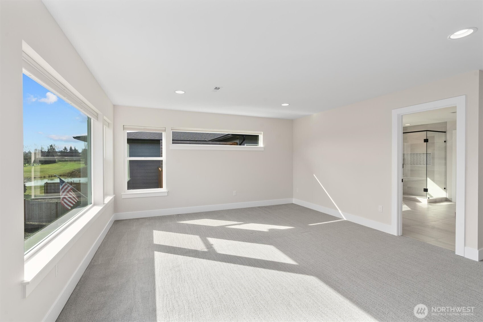 421 Rockefeller Avenue Everett, WA 98201 - Photo 32 of 40 a view of empty room with wooden floor and fan