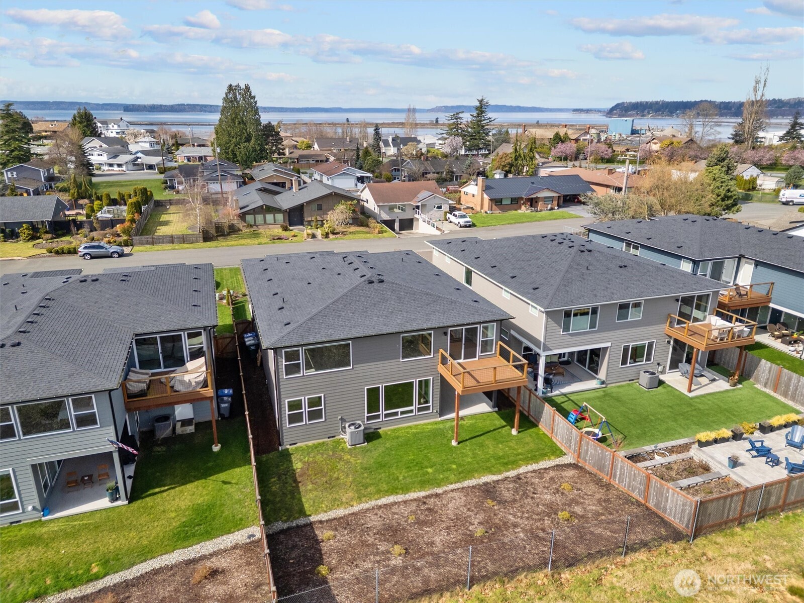 421 Rockefeller Avenue Everett, WA 98201 - Photo 37 of 40 a aerial view of a house with a yard and lake view