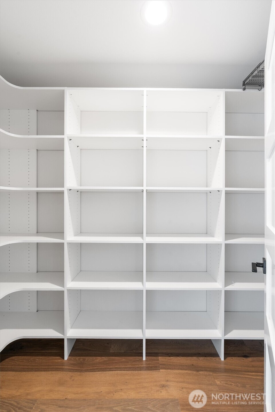 421 Rockefeller Avenue Everett, WA 98201 - Photo 8 of 40 a view of an empty room with empty racks