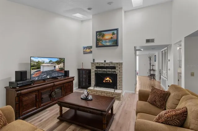 a bathroom with a shower sink and mirror