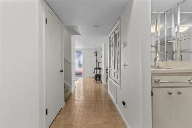 a room with painting and a table