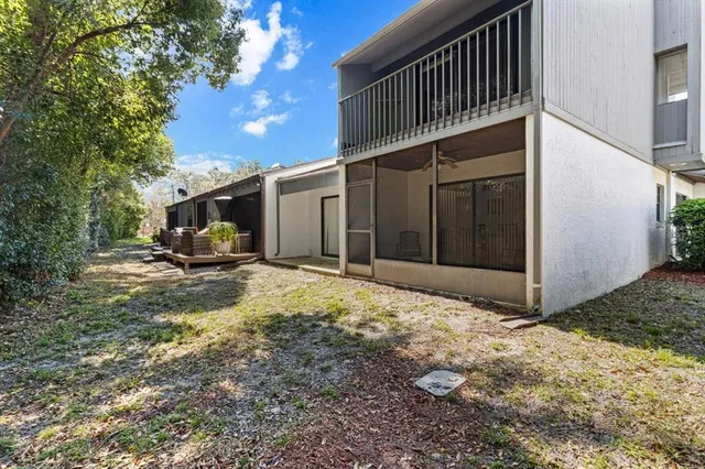 an aerial view of a residential houses with city view