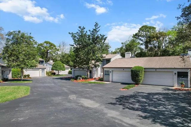 a view of a house with a tree