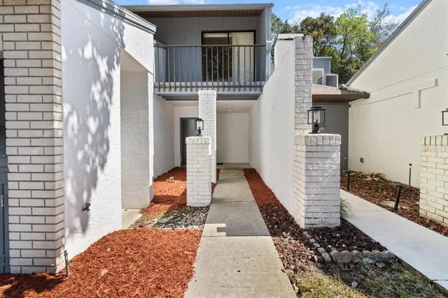 a house view with a outdoor space