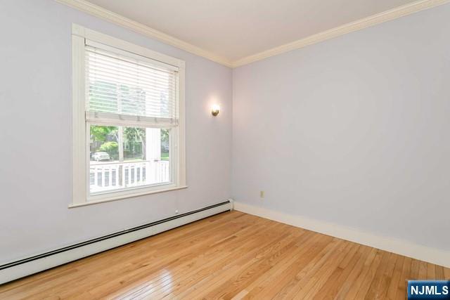 332 Closter Dock Road, Unit 1 Closter, NJ 07624 - Photo 12 of 21 an empty room with a window