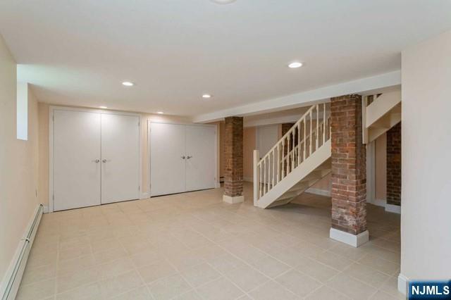 332 Closter Dock Road, Unit 1 Closter, NJ 07624 - Photo 14 of 21 a view of an empty room with stairs