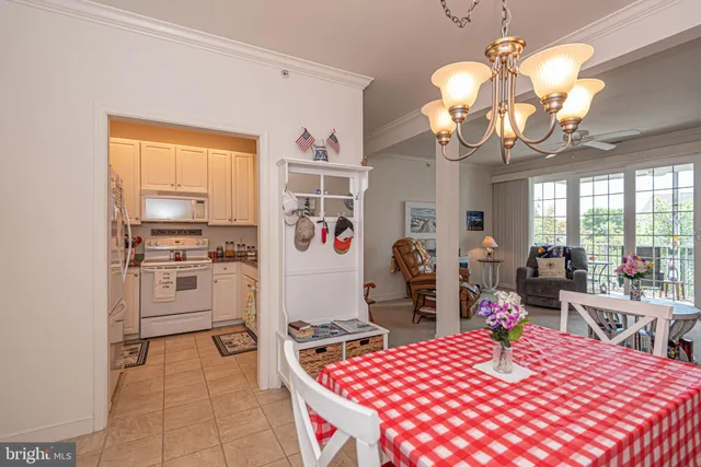 a very nice looking room with a large kitchen view
