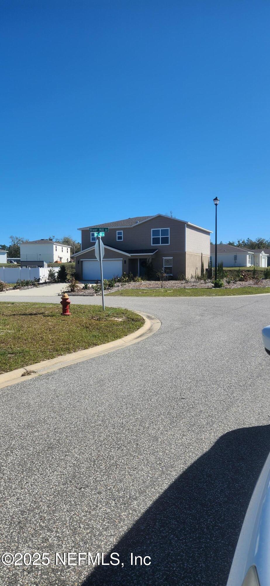 427 River Hill Welaka, FL 32193 - Photo 13 of 15 a view of a swimming pool with an ocean view
