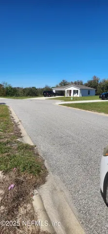 a view of a lake with a building in the background