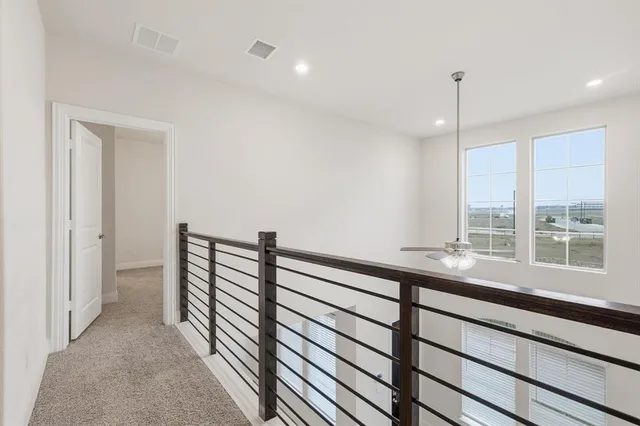 a view of a room with a large window