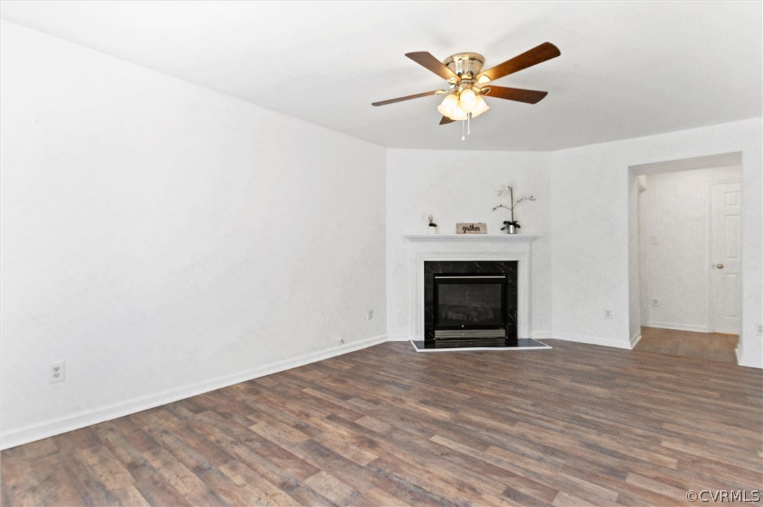 3030 Amherst Ridge Way Colonial Heights, VA 23834 - Photo 11 of 21 an empty room with fan and a fireplace