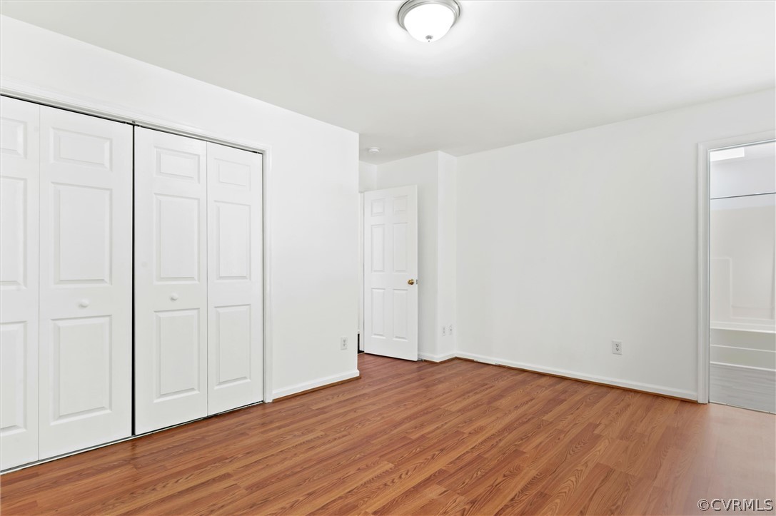 3030 Amherst Ridge Way Colonial Heights, VA 23834 - Photo 13 of 21 a view of an empty room with wooden floor