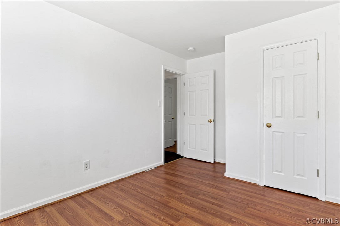 3030 Amherst Ridge Way Colonial Heights, VA 23834 - Photo 18 of 21 a view of an empty room with wooden floor