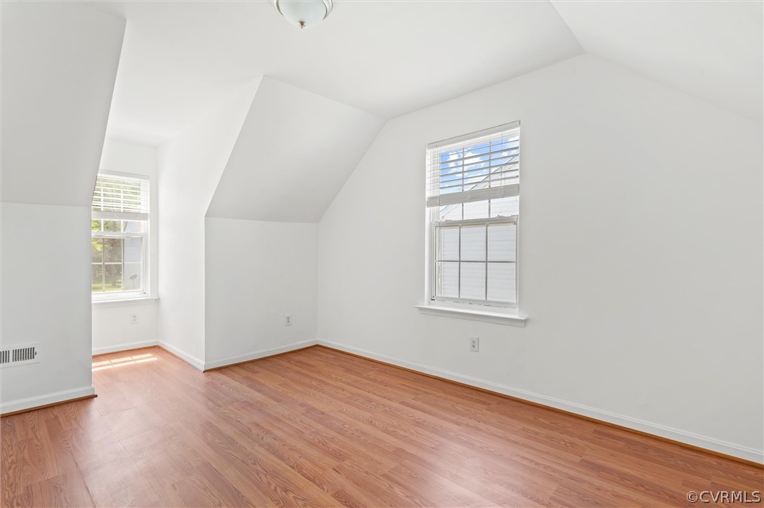 3030 Amherst Ridge Way Colonial Heights, VA 23834 - Photo 20 of 21 an empty room with wooden floor and windows