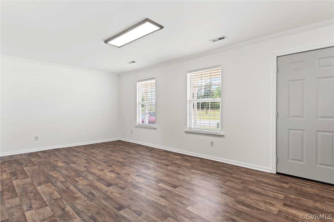 3030 Amherst Ridge Way Colonial Heights, VA 23834 - Photo 3 of 21 an empty room with wooden floor and windows
