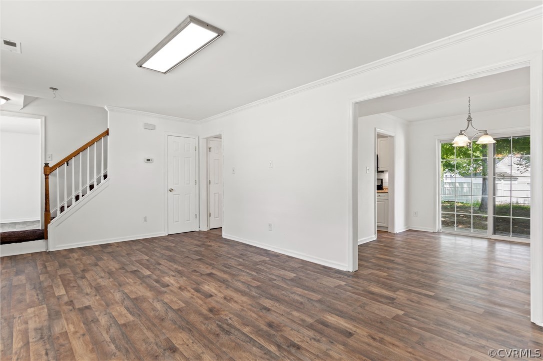3030 Amherst Ridge Way Colonial Heights, VA 23834 - Photo 5 of 21 a view of an empty room with wooden floor and a window