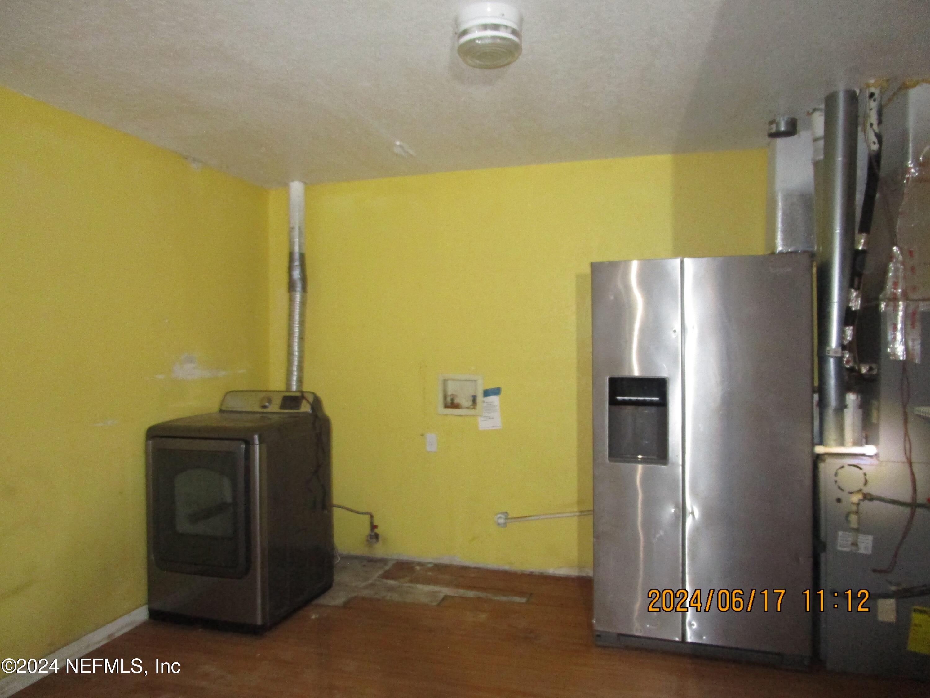 9302 Holden Park Road Hawthorne, FL 32640 - Photo 14 of 15 9302 Holden Park - laundry utility