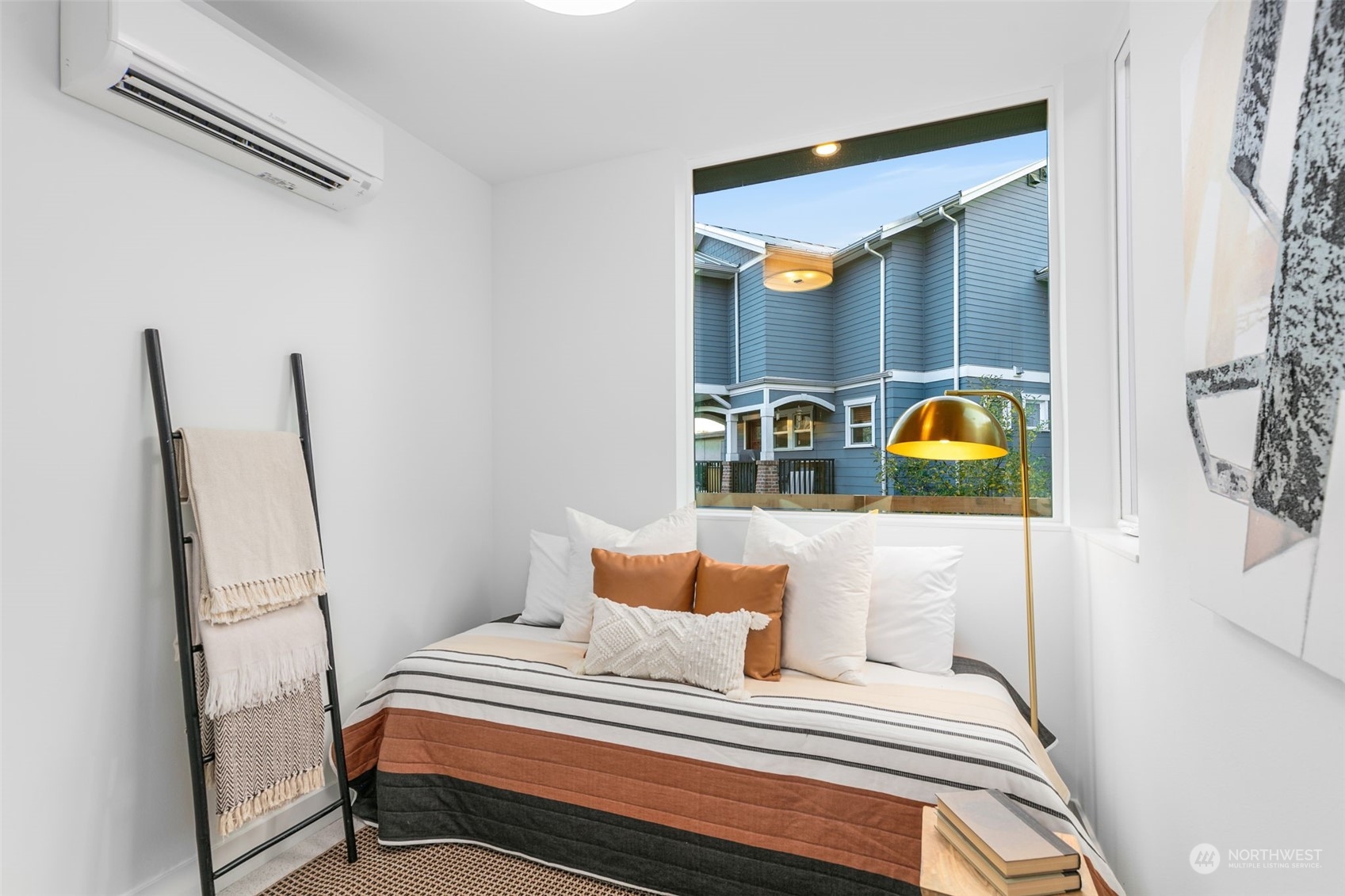 406 Northeast 75th Street Seattle, WA 98115 - Photo 15 of 29 a bedroom with bed and window