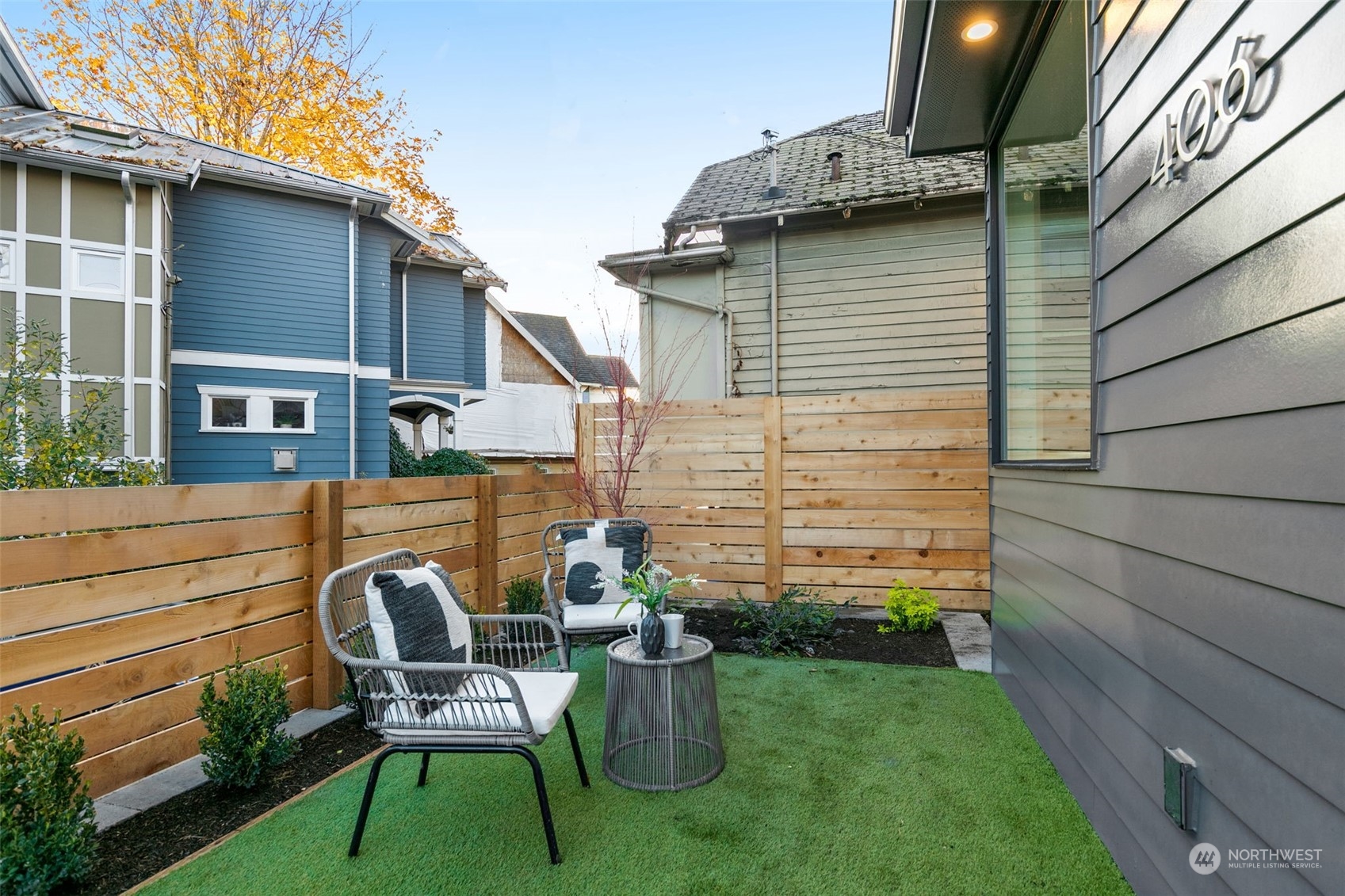 406 Northeast 75th Street Seattle, WA 98115 - Photo 23 of 29 a backyard of a house with seating space
