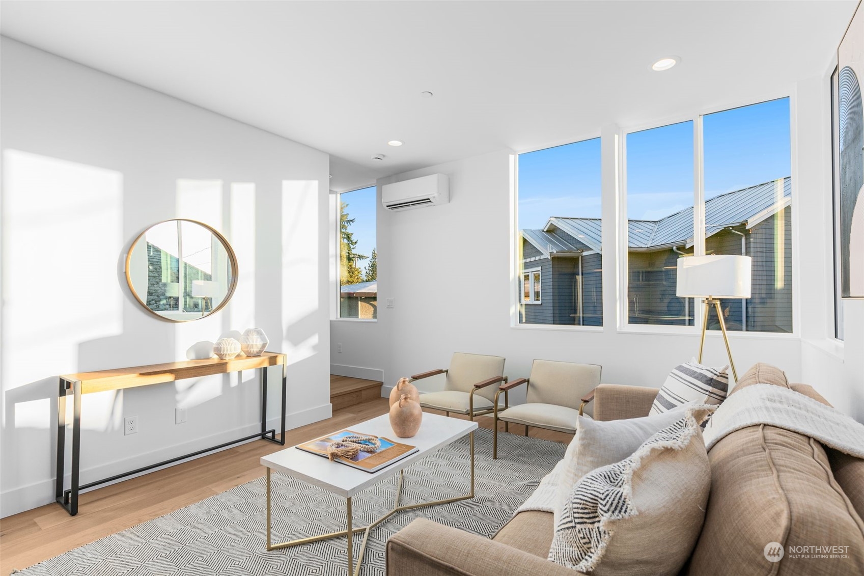 406 Northeast 75th Street Seattle, WA 98115 - Photo 5 of 29 a living room with furniture a rug potted plant and a large window
