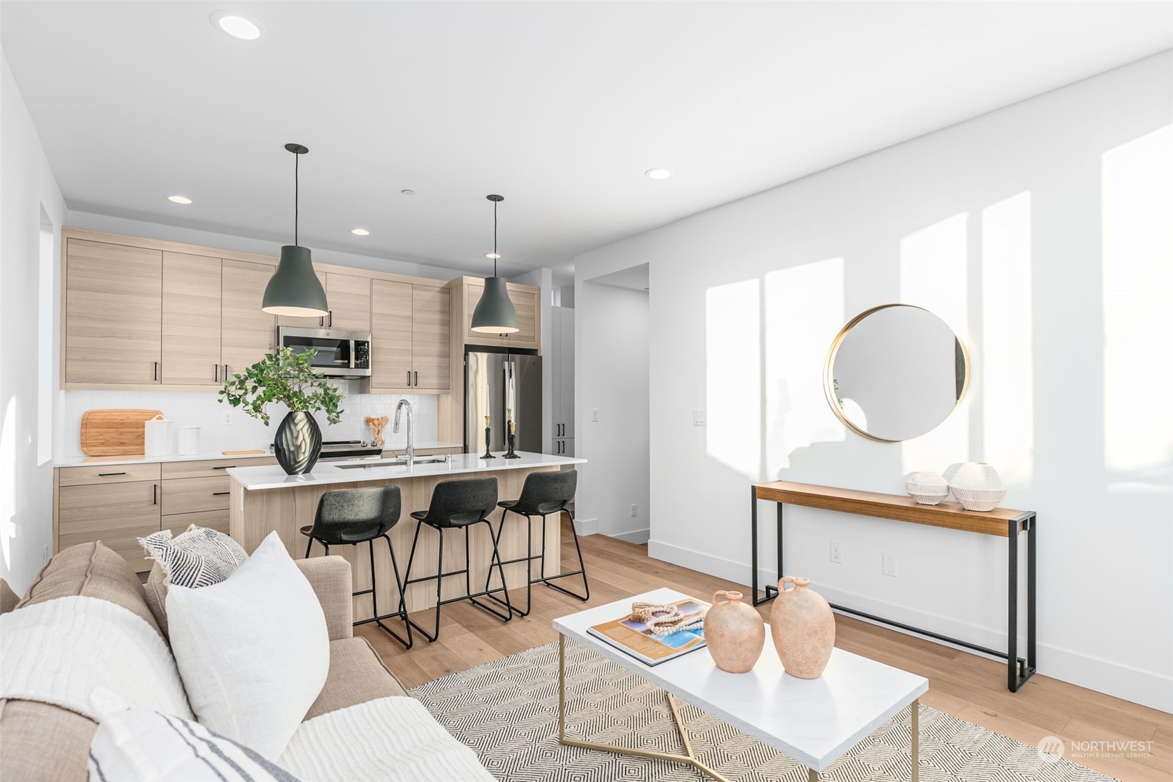 406 Northeast 75th Street Seattle, WA 98115 - Photo 6 of 29 a living room with furniture a chandelier and a potted plant