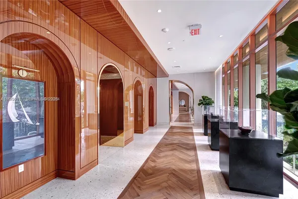 a view of a chairs and a table in the patio