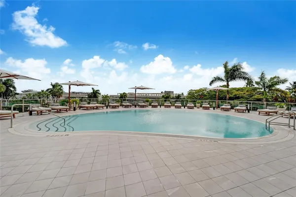 a view of kitchen with cabinets