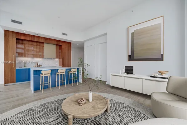 a living room with furniture and a table