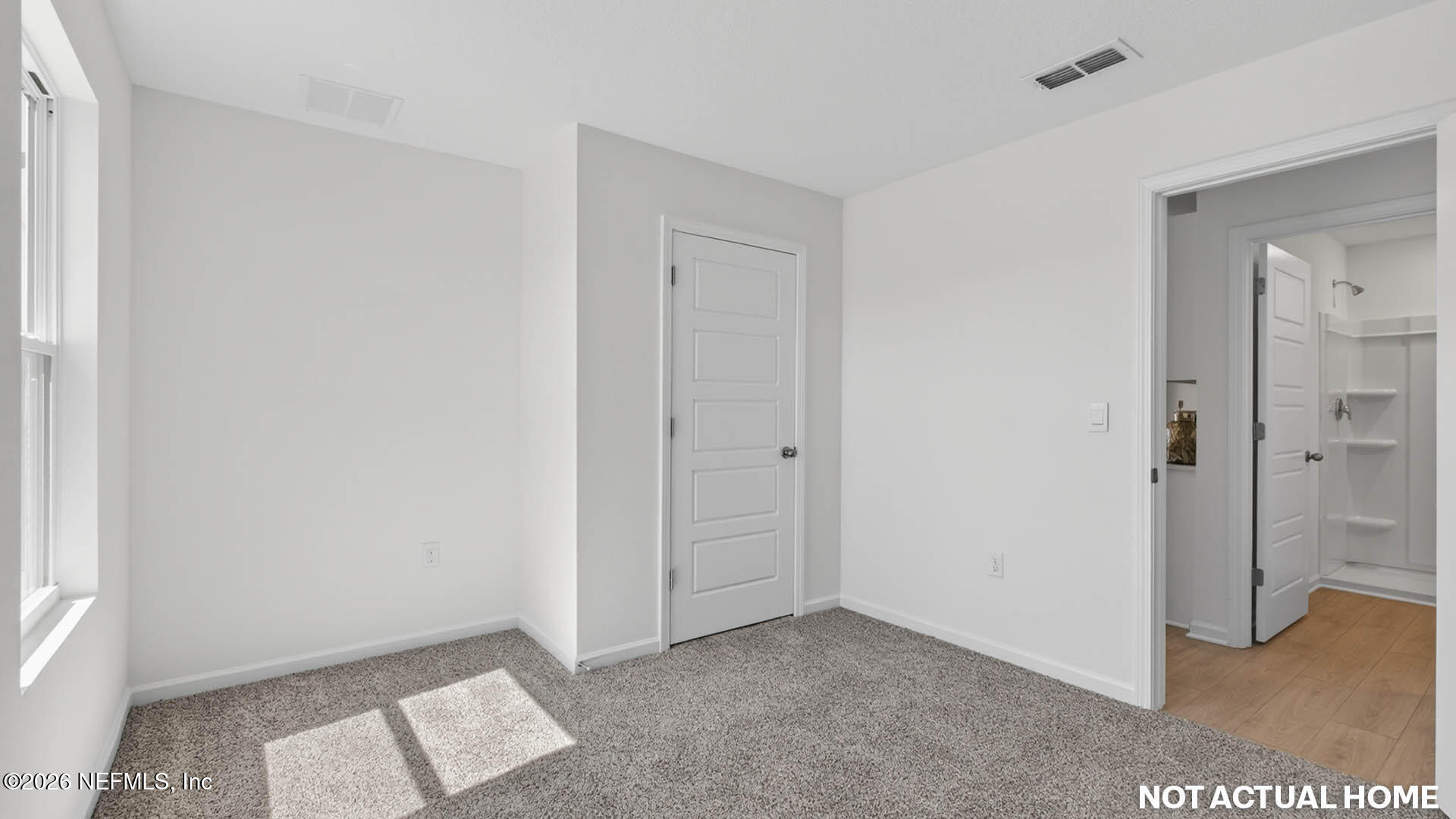 12095 Yew Tree Road Jacksonville, FL 32218 - Photo 23 of 61 a view of an empty room and window