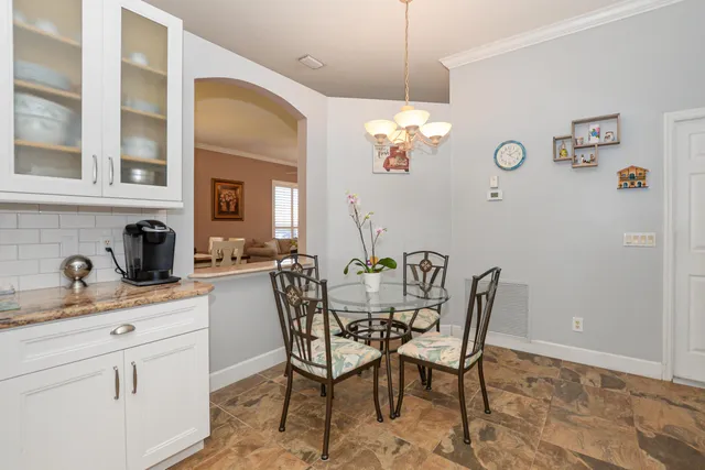 a view of a swimming pool with a yard