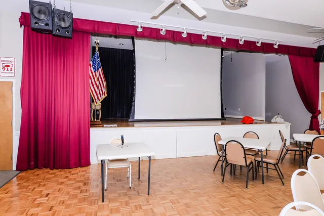 a view of a house with backyard and porch