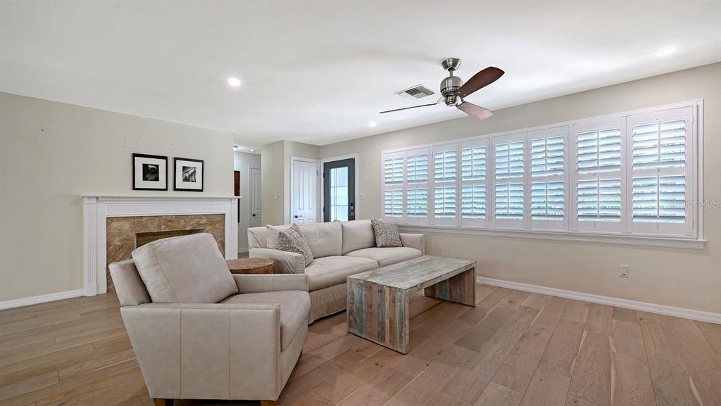 4810 Bay Shore Road Sarasota, FL 34234 - Photo 14 of 47 a living room with furniture and a large window