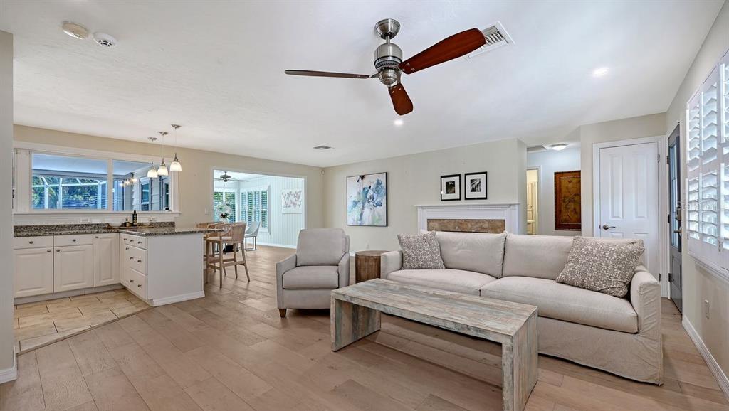 4810 Bay Shore Road Sarasota, FL 34234 - Photo 15 of 47 a living room with furniture and kitchen view